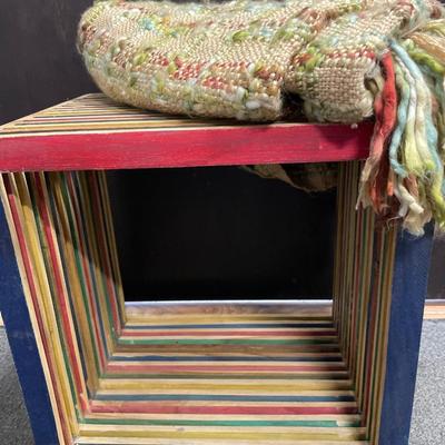 Colorful wood crate and blanket