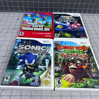 4 Wii Games; Mario Sonic and Donkey Kong 