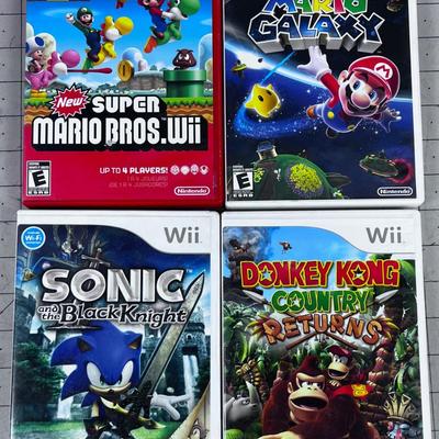4 Wii Games; Mario Sonic and Donkey Kong 