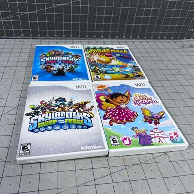 4 Wii Games; Dora The Explorer