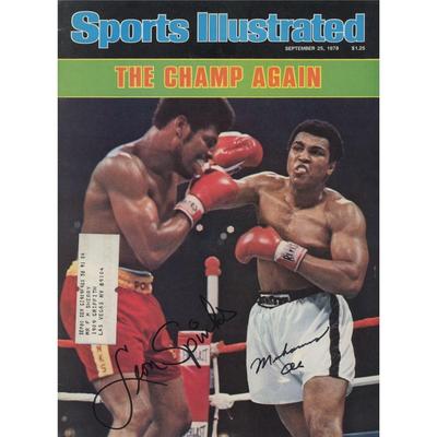 Leon Spinks and Muhammad Ali signed magazine. GFA Authenticated