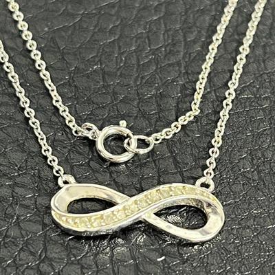Silver Infinity Pendant Necklace, Earrings, and Ring (17)