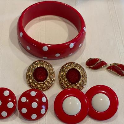 Red clip ons and bracelet