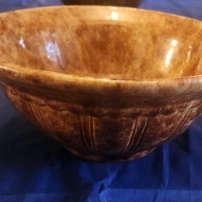 chipped gold/brown glass bowl