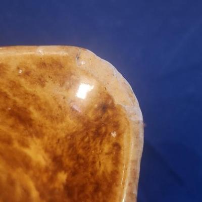 chipped gold/brown glass bowl