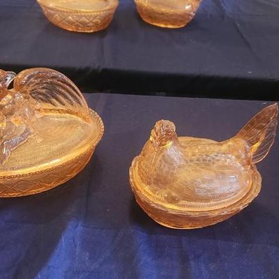 pink glass bird and 4 dishes