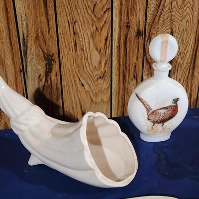 1069 Whiskey bottle w/horn thing