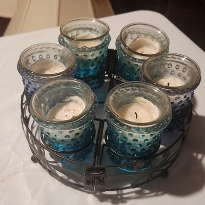 Mental and glass candle dÃ©cor