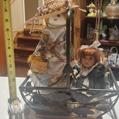 Dolls in basket - 2