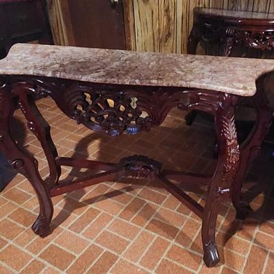 Long pink marble table