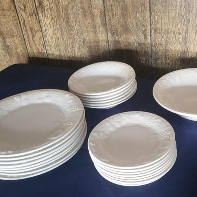 8 large bowls, 8 small plates, 6 bowls 1 serving bowl