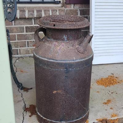 Rusty milk jug
