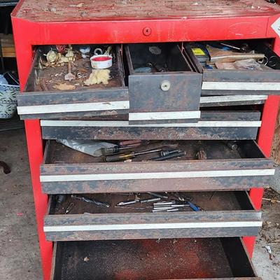 Short red tool box and contents