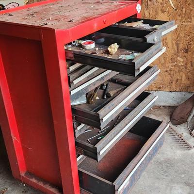 Short red tool box and contents