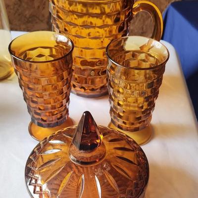 Gold glass pitcher and 2 glasses