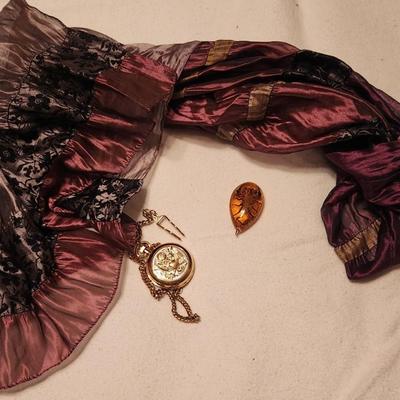 Watch, scarf, amber