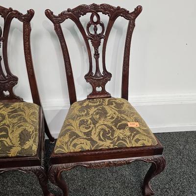 Four Chippendale Dining Chairs