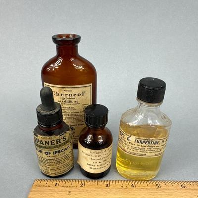 Group of 4 Antique Medicine bottles