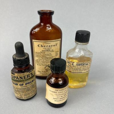Group of 4 Antique Medicine bottles