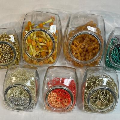 Tilt Glass Canisters with craft bead strands inside