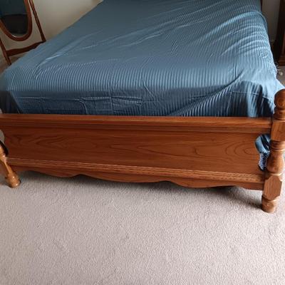 Queen sized bed with Headboard and footboard