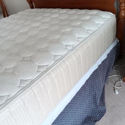 Queen sized bed with Headboard and footboard