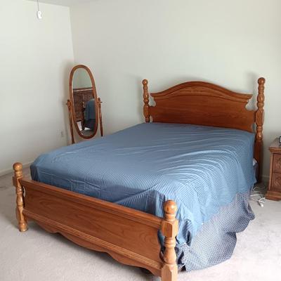 Queen sized bed with Headboard and footboard