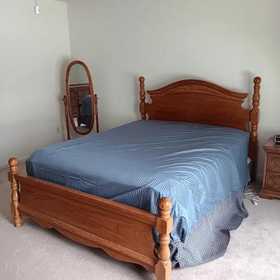 Queen sized bed with Headboard and footboard