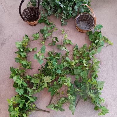 Faux ivy vines with basket of faux greenery and two wicker baskets