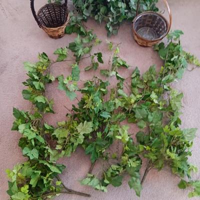 Faux ivy vines with basket of faux greenery and two wicker baskets