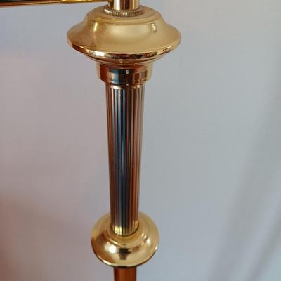 Brass adjustable swing-arm floor lamp