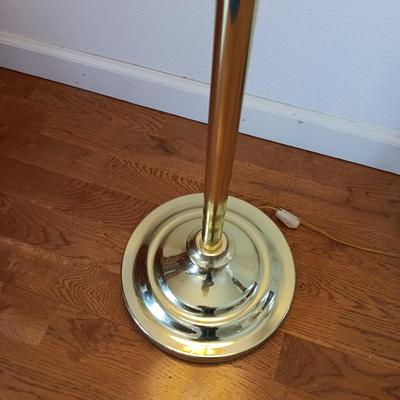 Brass adjustable swing-arm floor lamp