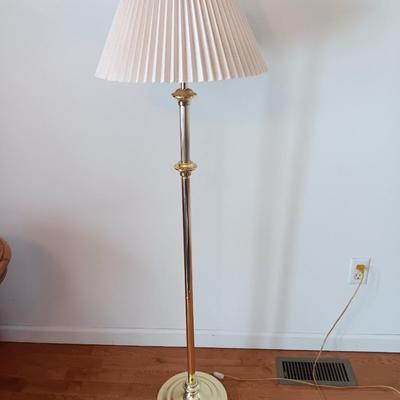 Brass adjustable swing-arm floor lamp