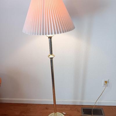 Brass adjustable swing-arm floor lamp
