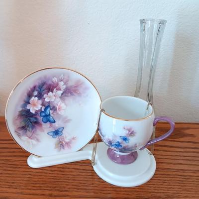 Matching butterfly cup & Saucer set with display base and a glass vase.
