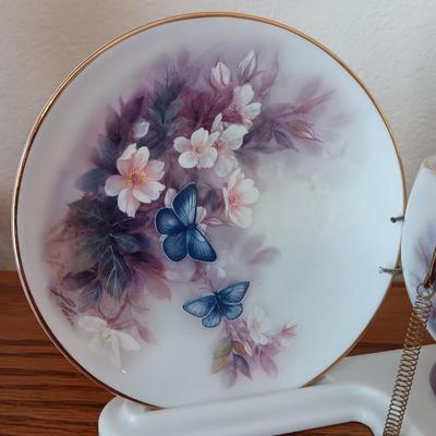 Matching butterfly cup & Saucer set with display base and a glass vase.