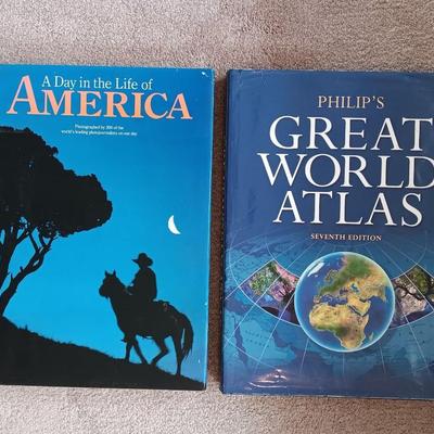 Two coffee table books - Great World Atlas and A Day in the life of America