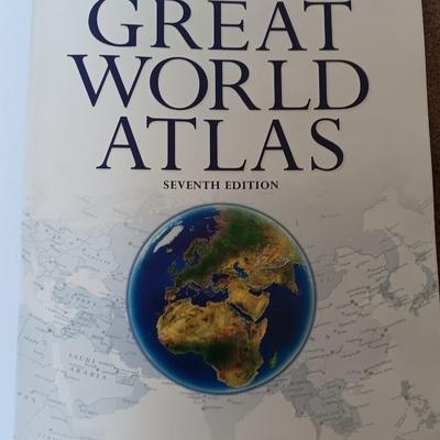 Two coffee table books - Great World Atlas and A Day in the life of America