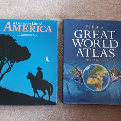 Two coffee table books - Great World Atlas and A Day in the life of America