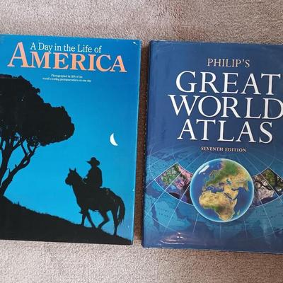 Two coffee table books - Great World Atlas and A Day in the life of America