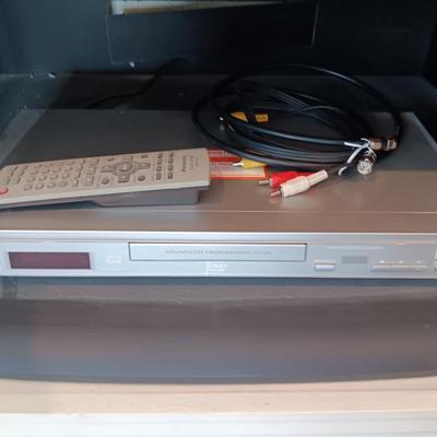 Panasonic DVD Player with remote control and an assortment of DVD videos