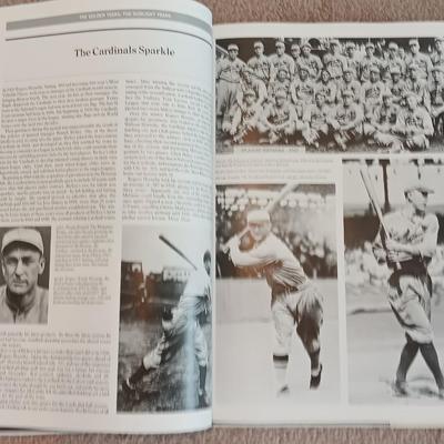 Two coffee table books - Guinness World Records 2000 Millennium edition and The Pictorial History of Baseball