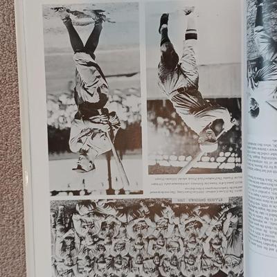 Two coffee table books - Guinness World Records 2000 Millennium edition and The Pictorial History of Baseball