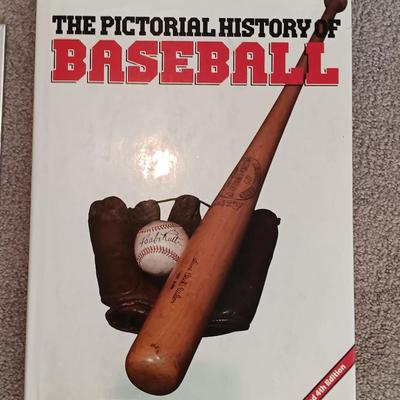 Two coffee table books - Guinness World Records 2000 Millennium edition and The Pictorial History of Baseball