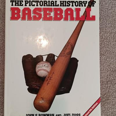 Two coffee table books - Guinness World Records 2000 Millennium edition and The Pictorial History of Baseball