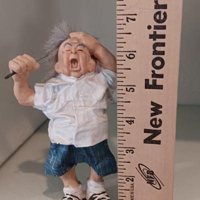 Two collectible Golfing figures - old man golfing and Worlds Greatest pottery with corked top golfer
