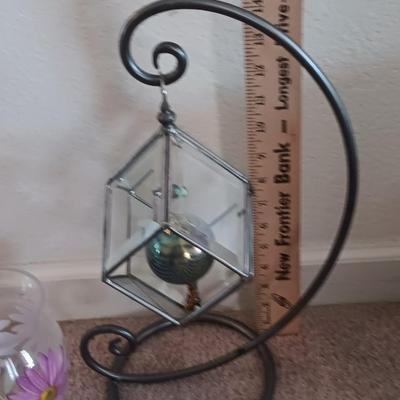 Metal framed display with glass prism and friendship ball and a hand painted floral vase