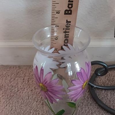Metal framed display with glass prism and friendship ball and a hand painted floral vase