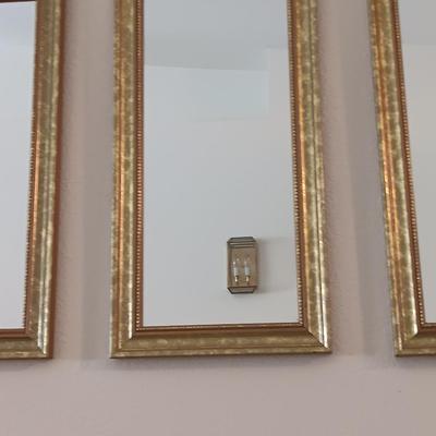 Three-piece gold framed mirror set