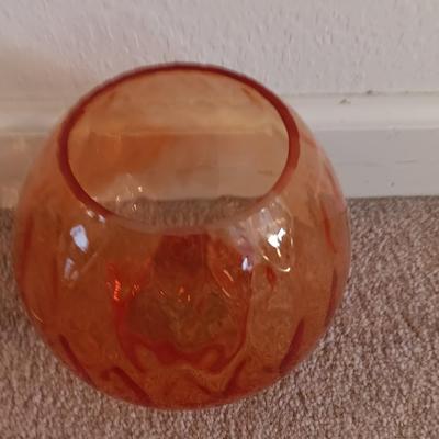 Metal display hanger with glass prism and vintage round orange glass bulb vase